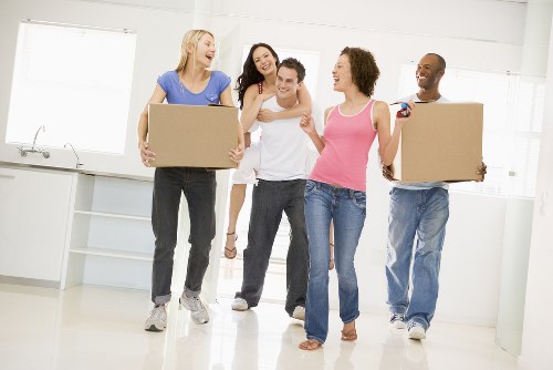 Man with van moving boxes and furniture in Putney