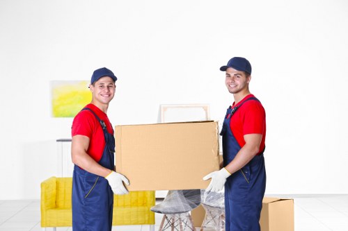 Office removals planning in Putney with moving boxes and desks