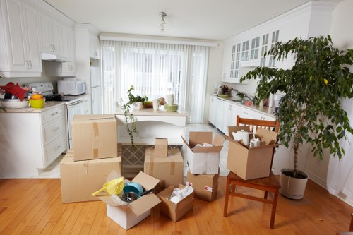 Loading household items into a moving truck in Putney