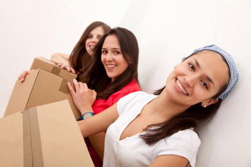 Careful wrapping and labelling of fragile belongings during a Putney packing service