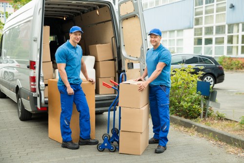 Load-based and cubic-yard quote options for a Putney van service