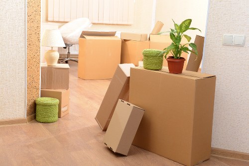 Packed boxes and furniture ready for removal service